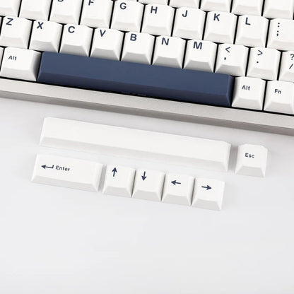 Teclado mecánico MyKeyboard Epomaker P75 con teclas blancas y barra espaciadora azul, mostrando teclas de repuesto
