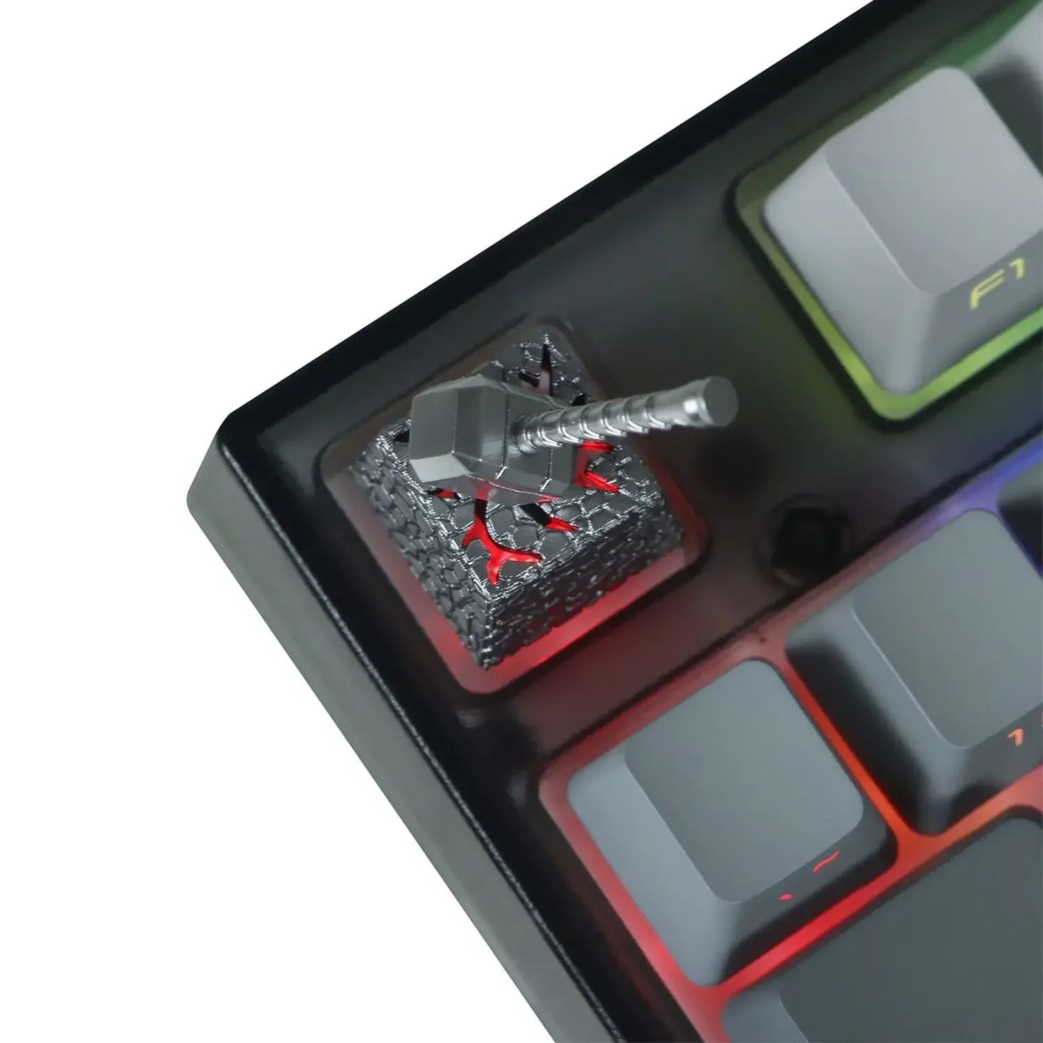Keycap artesanal MyKeyboard con diseño de martillo de Thor sobre base de piedra agrietada con iluminación roja