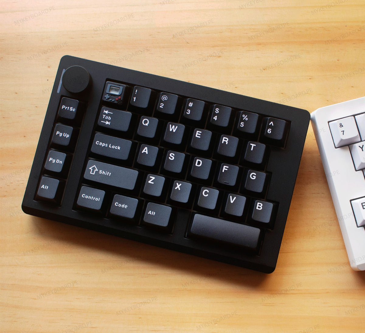 Teclado mecánico dividido MyKeyboard Epomaker Split 70 con teclas negras, perilla de volumen y diseño ergonómico