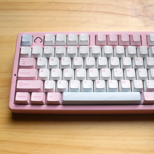 Teclado mecánico MyKeyboard YUNZII AL98 rosa con teclas PBT blancas y cuerpo de aluminio CNC sobre mesa de madera